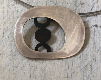 Sterling Silver pendant with oxidized detail