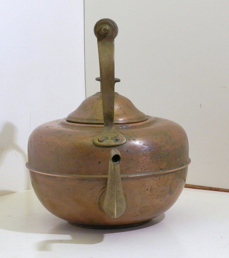 with wood handles. Small Copper and tin Tea Kettle