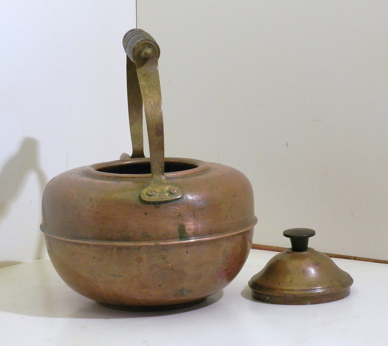 with wood handles. Small Copper and tin Tea Kettle