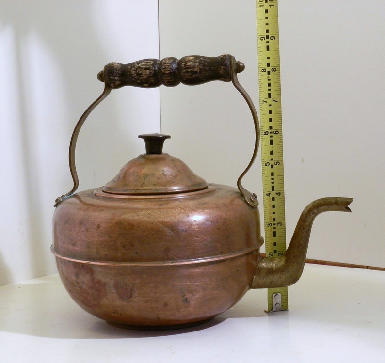with wood handles. Small Copper and tin Tea Kettle