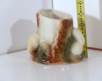 1930's or 1940's style ceramic vase or planter with cute stump and mushroom design