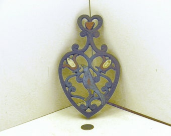 Black Cast Iron pot holder, Heart, Bird and Flower pattern.