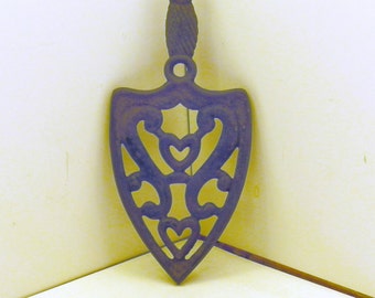 Black Cast Iron pot holder, two Heart pattern.