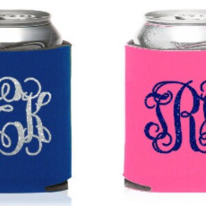 May include: Two personalized can coolers, one blue with silver glitter monogram "DKK" and one pink with blue glitter monogram "SRH".