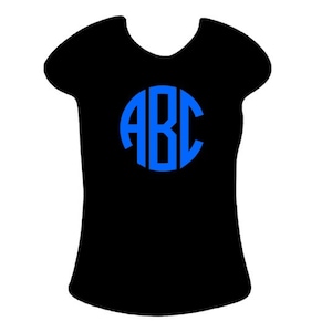 May include: A black t-shirt with a blue circle monogram that says "ABC" on the front.
