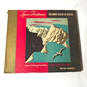 May include: A vintage record album cover featuring a colorful illustration of white cliffs with birds flying overhead. The album is titled "The White Cliffs of Dover" by Lynn Fontanne. The text "Musical Setting by Frank Black" and "A Poem by Alice Duer Miller" are printed below the illustration. The album is a Victor Records release.