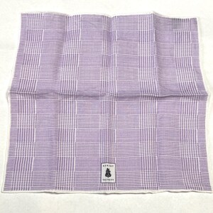 May include: A folded purple and white patterned handkerchief with a white border. The handkerchief has a plaid design and a small label with text and a crest. The handkerchief is made of a soft fabric.