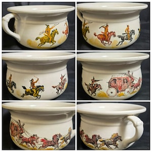 May include: A collection of six white ceramic chamber pots with hand-painted scenes of Native Americans on horseback and stagecoaches. Each pot has a handle and a wide rim, with variations in the painted designs.