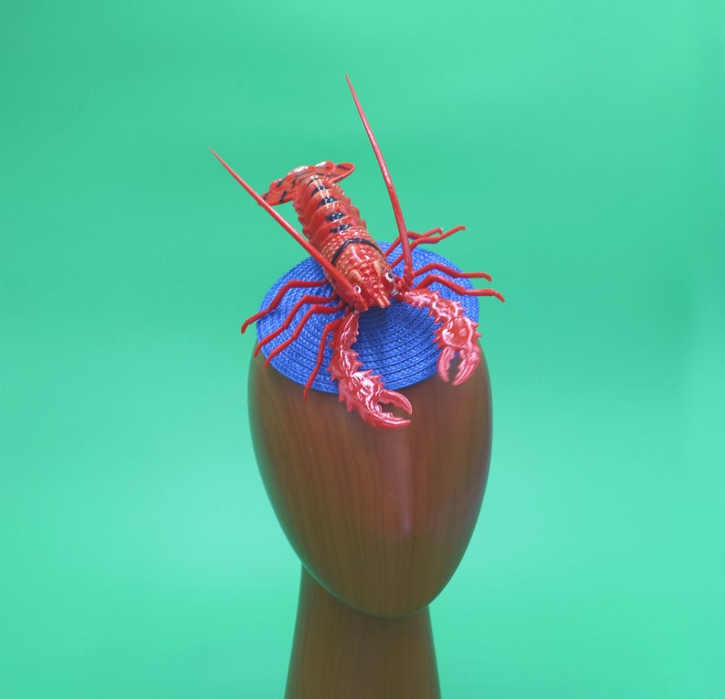 Surreal Red Lobster on Woven Black and White Swirl Straw ...