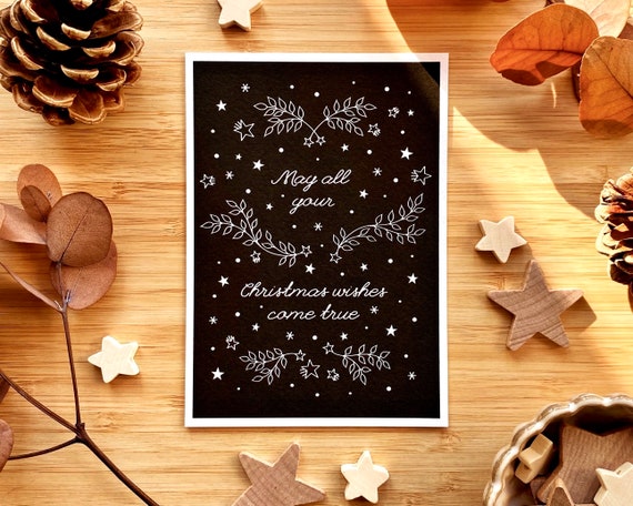 May all your Christmas wishes come true. Black and white Christmas card. Stars and leaves Christmas card. Christmas wishes.