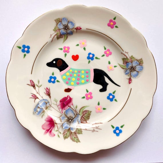 Cute dachshund with a green jumper with dots, hand painted vintage plate. Decorative wall plate.