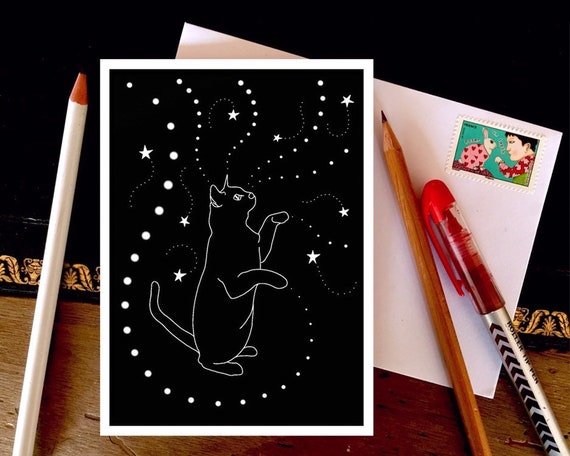 Black cat playing with stars, greeting card. Halloween card.