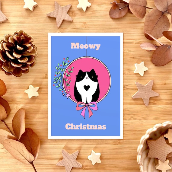 Meowy Christmas. Cute cat in a wreath Christmas card.
