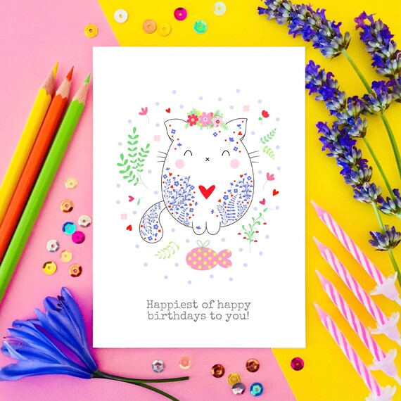 Cute cat with gift birthday card. Happiest of happy birthdays to you!
