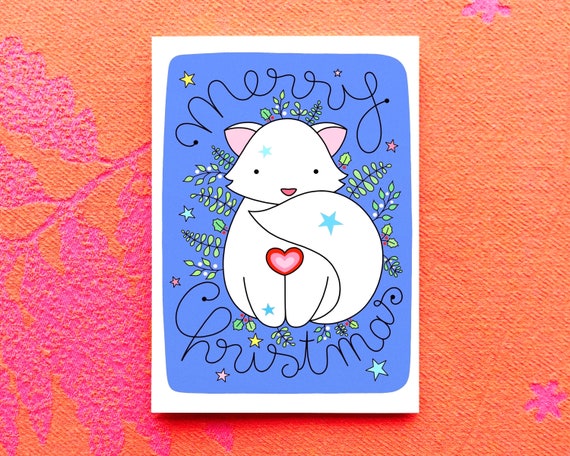 Snow fox Christmas card. Cute winter fox card. White fox with winter foliage. Cute Christmas card.