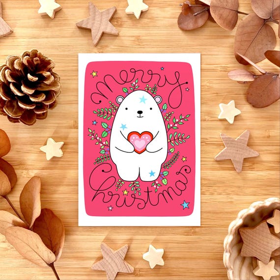 Snow bear Christmas card. Cute polar bear with winter foliage. Cute Christmas card. Pink Christmas card with a polar bear.