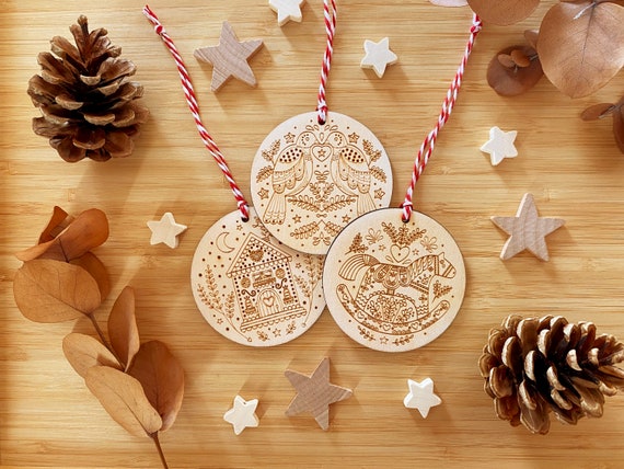3 laser cut wooden Christmas ornaments. Scandi inspired Christmas tree decorations. Laser engraved wooden ornaments with optional gift box.