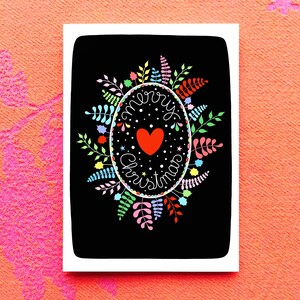 Rainbow Christmas wreath and heart on black card. Winter foliage wreath. Merry Christmas. Mistletoe and holly wreath. image 3