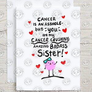 May include: A white card with a pink cartoon character wearing sunglasses and a bow. The card reads "Cancer is an asshole - but you are my cancer crushing amazing badass sister!"