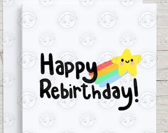 May include: A white card with a black and white pattern of faces. The card has the text "Happy Rebirthday!" in black with a rainbow and a yellow star with a smiling face.