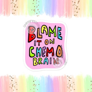 May include: Pink sticker with the text "Blame it on chemo brain" in colourful letters.