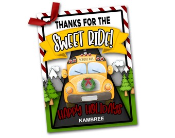 May include: A yellow school bus with a red and white striped border and the text "Thanks for the Sweet Ride!" and "Happy Holidays" with the name "Kambre" at the bottom.