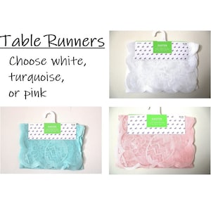 May include: Three Easter table runners in white, turquoise, and pink with a scalloped edge. Each runner has a small tag that says "Easter" and features a bunny rabbit pattern.