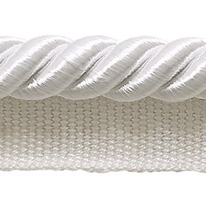May include: White braided trim with a rope-like texture. The trim is approximately 1 inch wide and has a smooth, satin-like finish.