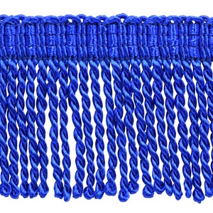 May include: Royal blue twisted fringe trim. This trim is perfect for adding a touch of elegance to any project.