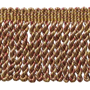 May include: Red and gold twisted fringe trim. The fringe is made of a thick, twisted yarn and has a subtle sheen.