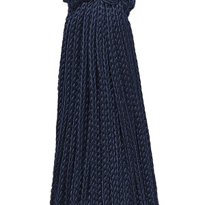 May include: A dark blue tassel with a knotted top. The tassel is made of a soft, woven fabric.