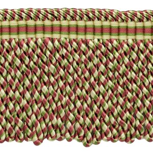 May include: Red, green and cream twisted fringe trim with a woven stripe detail.