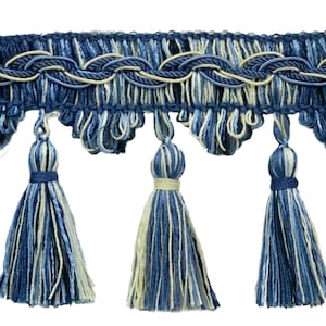 May include: Blue and white tassel trim with a braided rope design. The trim features a series of tassels with a blue and white striped pattern.