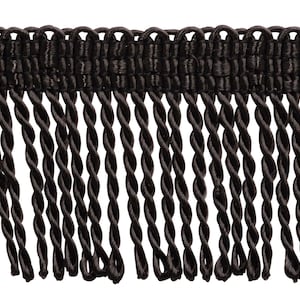May include: Black twisted fringe trim with a woven top. The fringe is approximately 1 inch long.