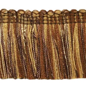 May include: Brown, beige, and white striped fringe trim with a woven top edge.