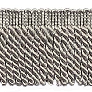 May include: Silver twisted fringe trim with a woven texture. The fringe is approximately 2.5 cm in length.