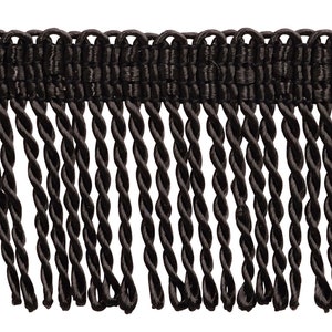 May include: Black twisted fringe trim with a woven top. The fringe is approximately 1 inch long.