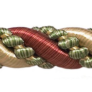 May include: A close-up of a braided trim with a twisted design. The trim is made of three colours: red, green, and beige.