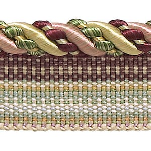 May include: A decorative trim with a braided rope design in shades of pink, green, gold, and burgundy. The trim also features a striped pattern with alternating bands of white, green, and beige.