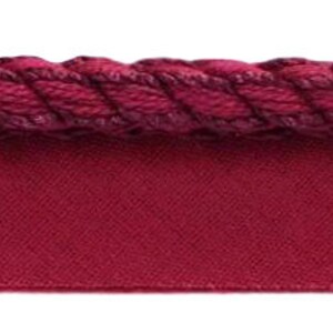 May include: Burgundy red trim with a rope-like texture. The trim is made of a soft, woven fabric.