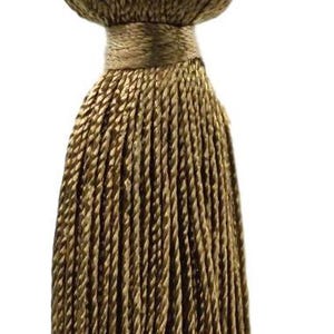 May include: A decorative tassel in gold and brown tones. It has a looped top, a rounded middle section, and a long, fringed base. The design is made of twisted threads, giving it a textured look. Suitable for interior decoration.
