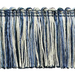 May include: Blue, white and black fringe trim with a woven top edge.