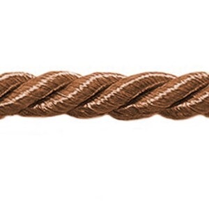 May include: A length of brown twisted rope, ideal for crafts and decoration. The rope features a consistent, tightly wound pattern, and is set against a white background.