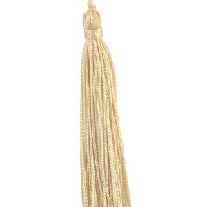 May include: A cream-colored tassel with a knotted top.