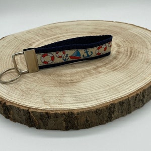 Coastal themed keychain featuring boats, anchors and buoys, seaside holiday home rental key, boat key, coastal themed home gifts for him her