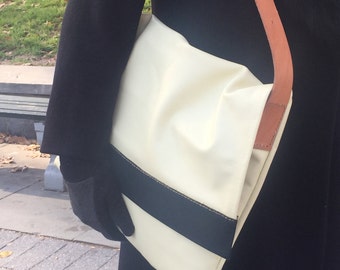 A. Poncé italiano archivo portátil multifunción hecha a mano de cuero con bolsillos 2 tonos crema, negro, marrón x H14 W17 x D1.5