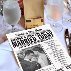 May include: A black and white newspaper style wedding announcement for Amanda & Josh. The announcement includes a photo of the couple, a wedding party list, and a note to guests. The announcement states that the wedding will take place at 4:00 PM.