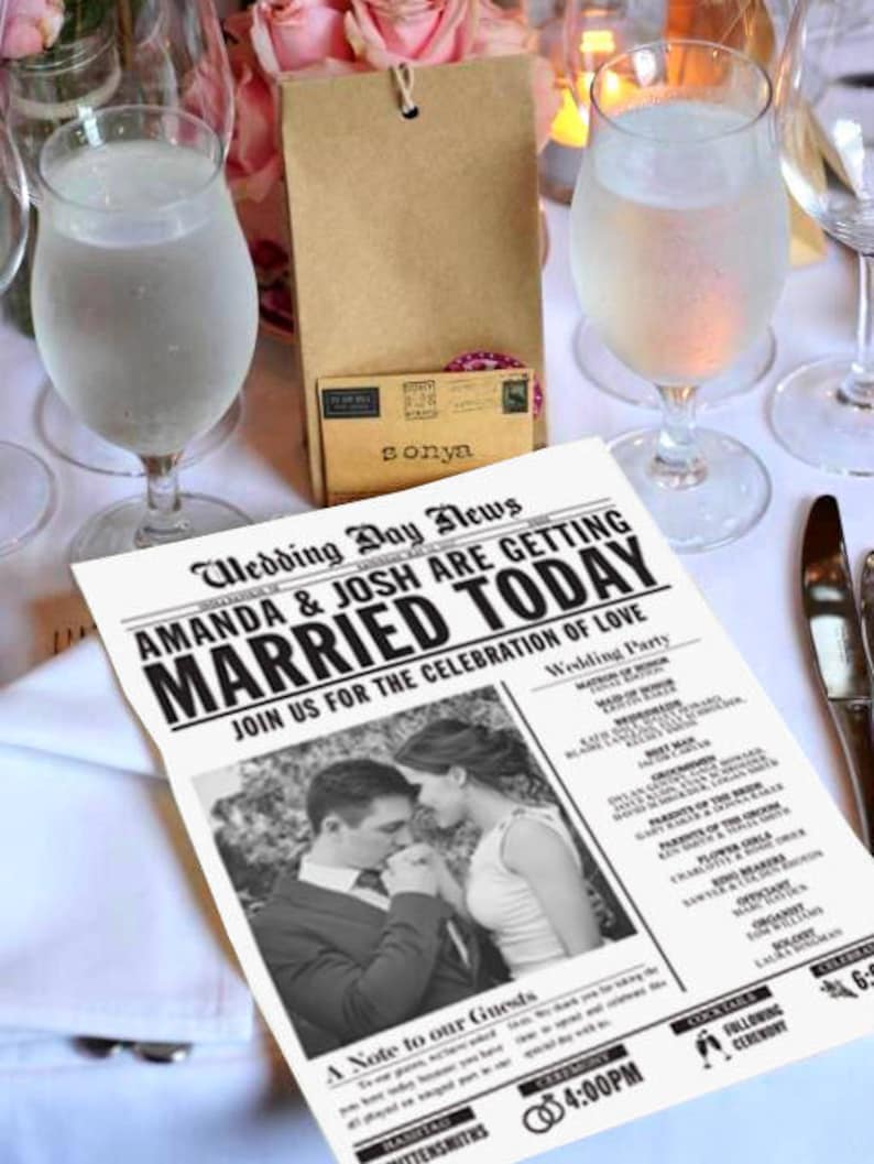 May include: A black and white newspaper style wedding announcement for Amanda & Josh. The announcement includes a photo of the couple, a wedding party list, and a note to guests. The announcement states that the wedding will take place at 4:00 PM.