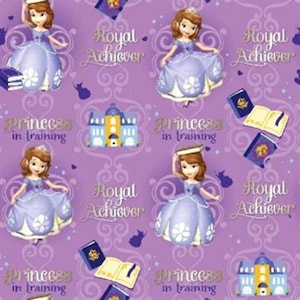 May include: Purple wrapping paper with a repeating pattern of a cartoon princess in a purple dress, a castle, books, and the text "Princess in training" and "Royal Achiever".