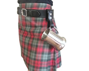 May include: A kilt in a red, green, and black plaid pattern, worn with a black leather belt and a stainless steel tankard. The tankard is suspended from a leather strap attached to the belt. The kilt is pleated and worn at the waist.